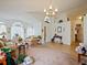 Spacious living area with vaulted ceiling, comfortable seating, and natural light at 1614 Stanbury Dr, Orlando, FL 32818