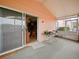 Relaxing sunroom with sliding door, seamlessly connecting indoor and outdoor spaces, perfect for enjoying natural light at 1614 Stanbury Dr, Orlando, FL 32818