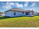 The home's exterior features a well-maintained lawn and a screened lanai, perfect for enjoying the outdoors at 17008 Sw 32Nd Ter, Ocala, FL 34473