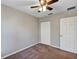 Bedroom with carpet, closet and a ceiling fan with lights at 17008 Sw 32Nd Ter, Ocala, FL 34473
