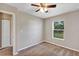 Bedroom with carpet, window and a closet with white doors at 17008 Sw 32Nd Ter, Ocala, FL 34473