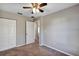 Bedroom featuring carpet, a closet and an open doorway at 17008 Sw 32Nd Ter, Ocala, FL 34473