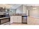 Modern kitchen featuring stainless steel appliances, granite countertops and white cabinets at 17008 Sw 32Nd Ter, Ocala, FL 34473