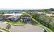 Two-story house with a landscaped yard and neighborhood pond at 175 Claffey Ct, Haines City, FL 33844