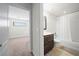 Small bathroom with tub, shower, and vanity at 175 Claffey Ct, Haines City, FL 33844