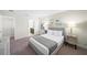 Guest bedroom with ensuite bathroom and a cozy atmosphere at 175 Claffey Ct, Haines City, FL 33844