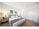 King-size bed, gray upholstered headboard, and double closets at 175 Claffey Ct, Haines City, FL 33844
