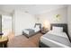 Bedroom with two twin beds and access to hallway at 175 Claffey Ct, Haines City, FL 33844
