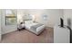 Bright bedroom with a comfortable bed and plenty of natural light at 175 Claffey Ct, Haines City, FL 33844