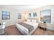Spacious bedroom with king-size bed, large windows and modern decor at 175 Claffey Ct, Haines City, FL 33844