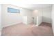 Upstairs hallway with staircase and access to other rooms at 175 Claffey Ct, Haines City, FL 33844