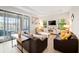 Living area featuring comfortable seating and access to a deck at 175 Claffey Ct, Haines City, FL 33844