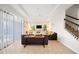 Bright living room with patio access and comfortable seating at 175 Claffey Ct, Haines City, FL 33844