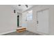Entryway with two doors and a small step up at 204 Louis St, Leesburg, FL 34748