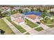 Aerial view of property with white border around property lines in a Gathering neighborhood at 2120 Marisol Loop, Kissimmee, FL 34743