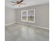 Bright bedroom features tile floors, a large window and neutral paint colors at 2120 Marisol Loop, Kissimmee, FL 34743