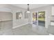 Bright dining area features tile floors, decorative lighting and sliding glass doors to the lanai at 2120 Marisol Loop, Kissimmee, FL 34743