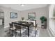 Dining room featuring table with seating, modern decor, and natural light at 2120 Marisol Loop, Kissimmee, FL 34743