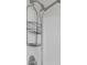 Close up of a shower with a shower head and basket for storage of bathing items at 2120 Marisol Loop, Kissimmee, FL 34743