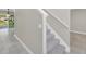 Interior view highlighting the carpeted staircase and neutral wall color at 2120 Marisol Loop, Kissimmee, FL 34743