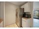Bright kitchen featuring modern stainless steel refrigerator and microwave and white cabinets at 230 Moree Loop # 4, Winter Springs, FL 32708