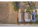 Aerial view of the property highlighting location, landscaping, and screened-in pool area at 2551 Bear Creek Ct, Kissimmee, FL 34747