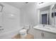 Clean bathroom with bathtub and white vanity at 2605 Andros Ln, Kissimmee, FL 34747