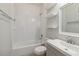 Bathroom with bathtub, sink and white tile at 4006 Markham Pl, Orlando, FL 32814