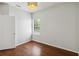 Empty bedroom with hardwood floors and window at 4006 Markham Pl, Orlando, FL 32814