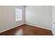 Empty bedroom with hardwood floors and window at 4006 Markham Pl, Orlando, FL 32814