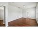 Spacious bedroom with hardwood floors and access to other rooms at 4006 Markham Pl, Orlando, FL 32814
