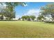 Quaint community featuring lush green lawns and charming homes at 4006 Markham Pl, Orlando, FL 32814