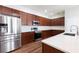 Modern kitchen with stainless steel appliances and ample cabinetry at 4006 Markham Pl, Orlando, FL 32814