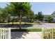 Residential street with lush green landscaping and homes at 4006 Markham Pl, Orlando, FL 32814