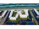 Overhead view of the condo complex highlighting buildings, parking, lush landscaping and beach access at 4175 S Atlantic Ave # 232, New Smyrna Beach, FL 32169