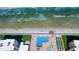 A beautiful overhead view of the beach, pool, and shuffleboard, showcasing the oceanfront amenities at 4175 S Atlantic Ave # 232, New Smyrna Beach, FL 32169