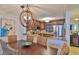 Dining room with a view of the open kitchen concept, stylish lighting and decor at 4175 S Atlantic Ave # 232, New Smyrna Beach, FL 32169