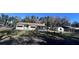 House with detached building, fenced yard, and trees at 421 Sw 23Rd St, Ocala, FL 34471