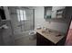 Clean bathroom with shower/tub combo and vanity at 421 Sw 23Rd St, Ocala, FL 34471