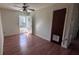 Charming bedroom with wood flooring and access to outdoor space at 421 Sw 23Rd St, Ocala, FL 34471