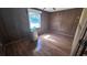 Simple bedroom with wood walls and laminate floor at 421 Sw 23Rd St, Ocala, FL 34471