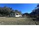 Ranch-style home with green exterior and lawn at 421 Sw 23Rd St, Ocala, FL 34471