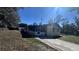Ranch-style home with screened porch and driveway at 421 Sw 23Rd St, Ocala, FL 34471