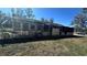 Single story home with covered patio and large yard at 421 Sw 23Rd St, Ocala, FL 34471
