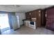 Small kitchen with white appliances and wood cabinets at 421 Sw 23Rd St, Ocala, FL 34471