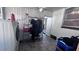 Laundry area with washer, dryer, and shelving at 421 Sw 23Rd St, Ocala, FL 34471