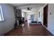 Living room with stone fireplace and wood floors at 421 Sw 23Rd St, Ocala, FL 34471