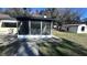 Screened porch with detached building visible at 421 Sw 23Rd St, Ocala, FL 34471