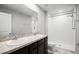 Bright bathroom featuring a double vanity, a shower over tub, and tiled floors at 514 Eagle Landing Blvd, Winter Haven, FL 33880