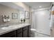 Bright bathroom featuring double sinks with a shower and tub combination, perfect for a modern home at 514 Eagle Landing Blvd, Winter Haven, FL 33880